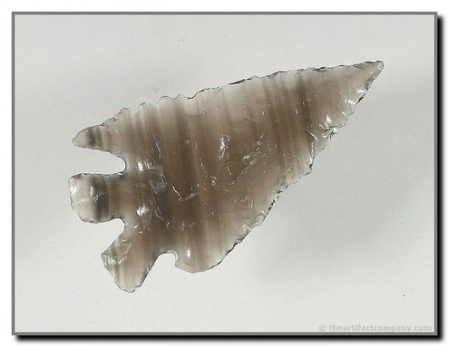 1 5/8" Elko Split Stem: Stupendeous banded translucent Obsidian. Ultra thin. Found near Crump Lake in Lake Co., Oregon. Ex- Akers Collection.