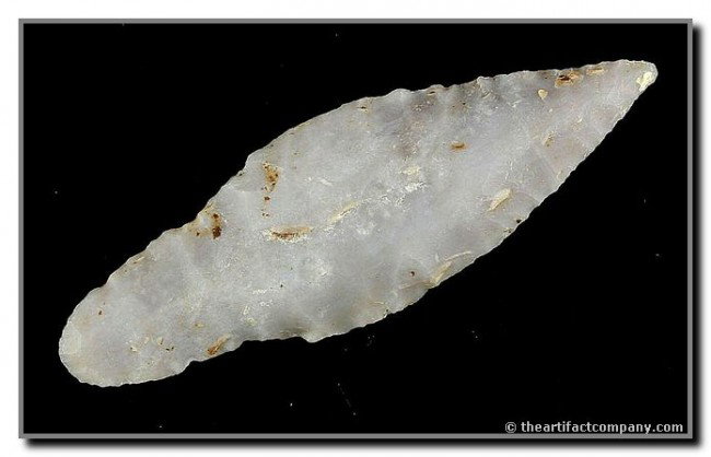 3 5/16" Gary: Totally translucent stemmed example from Arkansas. Excellent mineralization on this well flaked example.