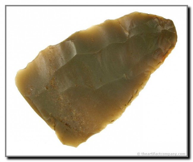 2" Clovis Flute Flake: Appears to be the remnant of a Clovis flute flake that the Indian then went ahead and made in to a handheld personal knife. Great secondary edgework on both edges. Pretty Carter Cave with lots of tran