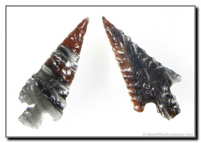 Awesome pair of Tri-flow Obsidian 'Gem-Quality' Da: Translucent striped red, black, and clear tri-flow Obsidian. 1 1/8" each. Truly gorgeous. Found in Oregon. Ex- Akers Collection.