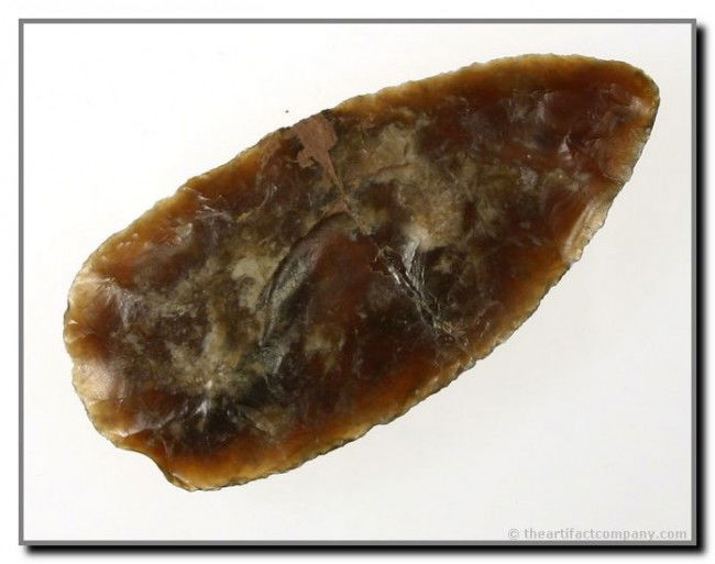 Beautiful 3 1/4" Knife River Blade / Knife: Highly translucent root beer color. Fantastic craftsmanship. Barely noticable but broken in half and reglued. Ex- Harlan Snyder. Found near Red Field, in Faulk Co., South Dakota.