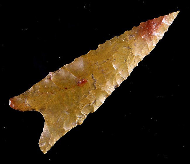 046: 2 1/2" Dalton - Jackson COA: From Greene Co., Arkansas. Made of a very pretty multicolored caramel and maroon high grade Crowley's Cobble Chert. Long extended needle tip. Ex- Doyle Barnett Collection. Jackson COA.