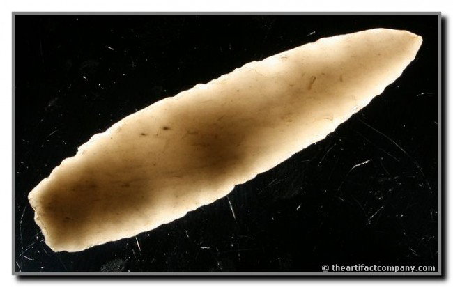 3 7/16" Angostura - Baker G9 COA: Awesome completely translucent silvery colored Novaculite. Found in Arkansas. Ex- Terry Allen Collection. Baker G-9 COA.