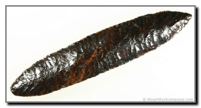 093: 8 1/4" Black & Red Obsidian Blade: Found near Iguala approximately 60 miles from state capital Chilpancingo in the Mexican state of Guerrero. Truly awesome. This piece exhibits some of the best flaking we have ever seen a relic from an