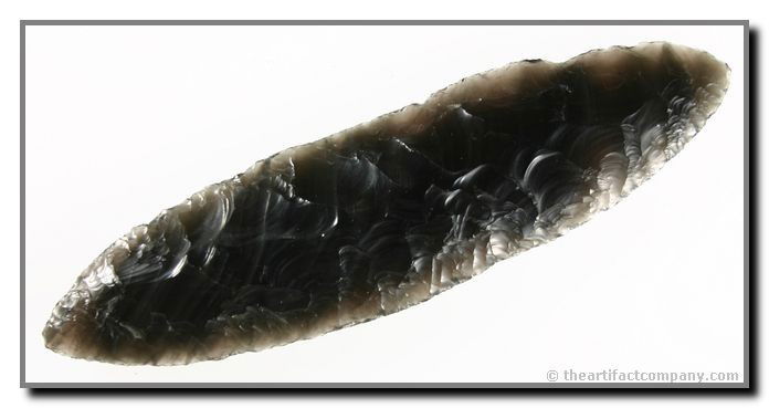 6 3/8" Bipointed Knife: Obsidian. Northern California. Ex - Bill Heap Collection. Pretty translucent banded material.