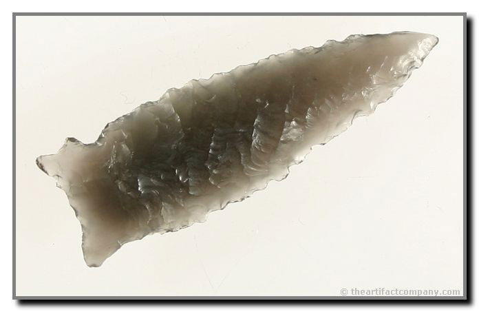 2 1/16" Buchanan Eared: Flaking beyond belief!!! And translucency to die for. Obsidian Classic. One ear appears to have uniquely notched along the way. Great rock!! Found by Justin Matthews in Klamath Co., Oregon.