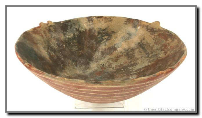 8 3/8" Quapaw Engraved Swirl Bowl: Unique redware bowl with a spiral engraved into base. AR/MS Type. Restored. Ex - Chestnut Collection