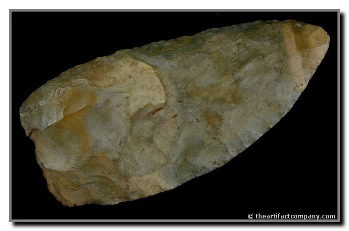 3 3/8" Clovis Preform: Distinct flute on one side. Hafted and used as a knife. Really pretty material with a 'Bullseye'. Found by John Miller in Clay Co., Indiana.