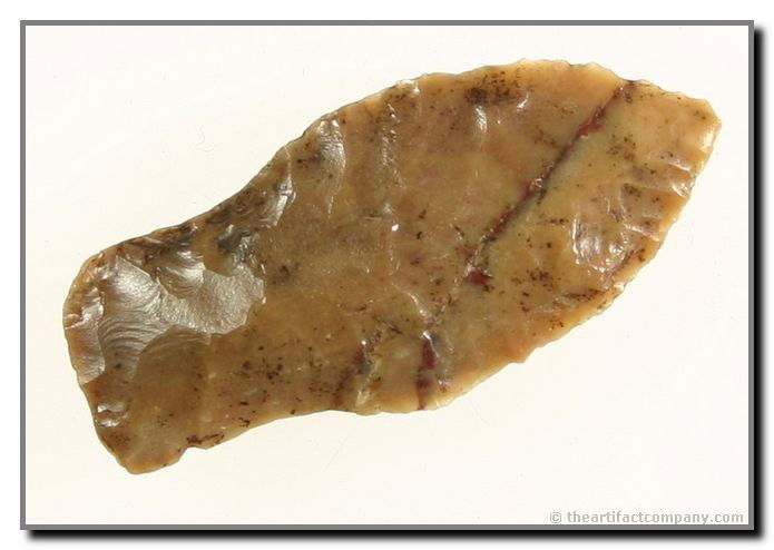 1 15/16" Hell Gap - Jackson COA: Really fine Hell Gap made of a multicolored glossy somewhat translucent high grade flint with exotic cob-webbing in the material. Found by George Green in Lincoln Co., Nebraska. Jackson COA