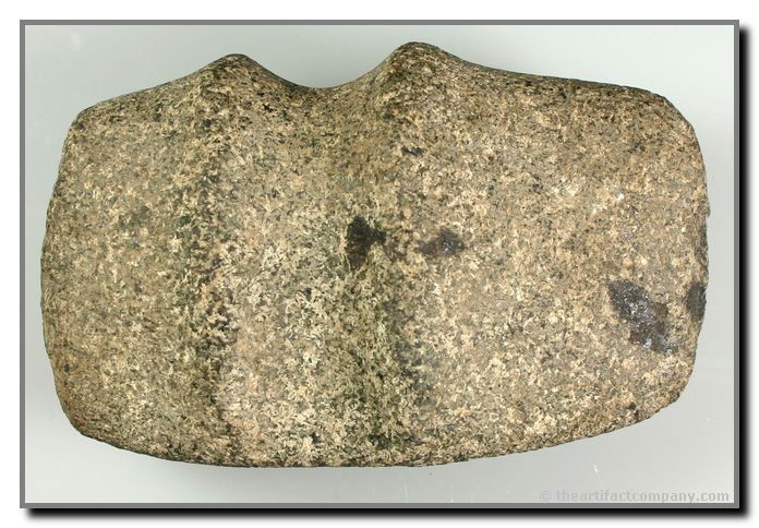 5 1/4" 3/4 Groove Axe: Nicely developed form with exceptionally high ridges. Speckled granite. Deep flute on one edge. Found by John Miller in Clay Co., Indiana.