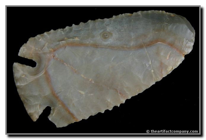 3 3/8" Dovetail: Excellent candidate for restoration. Central Kentucky. Carter Cave flint with superb ribbon flaking and serrations.