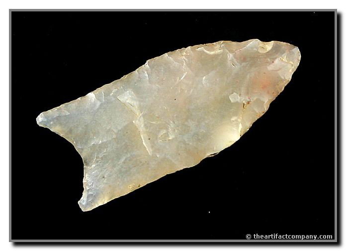 011: 1 9/16" Paleo Dart (Small Clovis) - Bennett COA: Awesome semi-translucent white Chalcedony. Small dart form distinctly fluted on both sides. Recovered in Mesa Co., Colorado. Bennett COA.