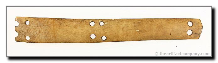 7 7/8" Eskimo Armor Plate: Many do not know that the Eskimos and surrounding tribes often had bloody battles. This armor plate would have been used in conjunction with others as protection during such a battle. Late 19th centur