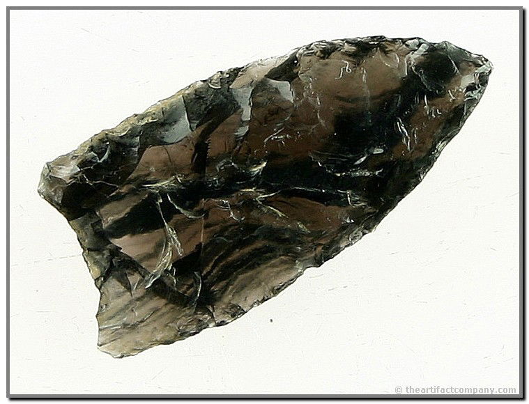 006: 1 1/2" Black Rock Concave - Jackson COA: Truly a showstopper. Highly translucent streaked and mottled Ice Obsidian. Elko Co., Nevada. Ex- Sam Demaline Collection. Jackson COA.