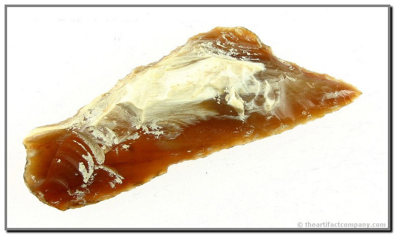 3 1/4" Knife River Burin / Perforater: Form dates from the Paleo times. This example is beauiful, perfect, translucent, patinated root beer and white, and expertly crated. Found in North Dakota.