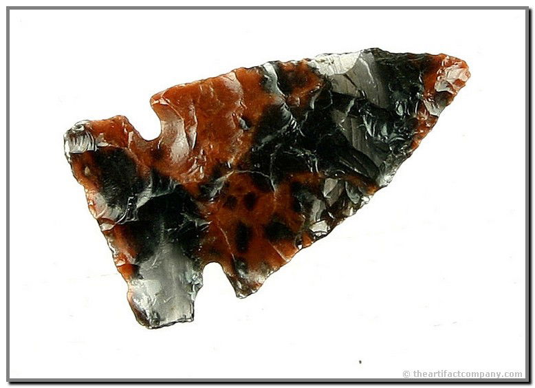 1" Desert General: Beautiful tri-flow Obsidian example. Lots of translucency and in perfect condition. Found in Lake Co., Oregon. Ex- Kirkpatrick Collection.