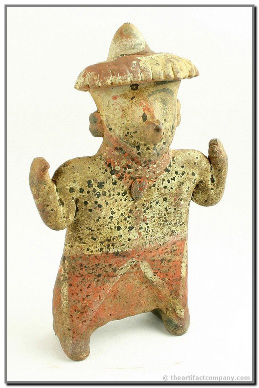 7 1/8" Nayarit Figurine - Jackson COA: Exceptionally fine example. Completely intact and loaded with minerals. Nice polychrome paint still quite vibrant. Hat, necklace, pendant, has it all. Stands sturdily for display. Ex- Sides & Coughlin