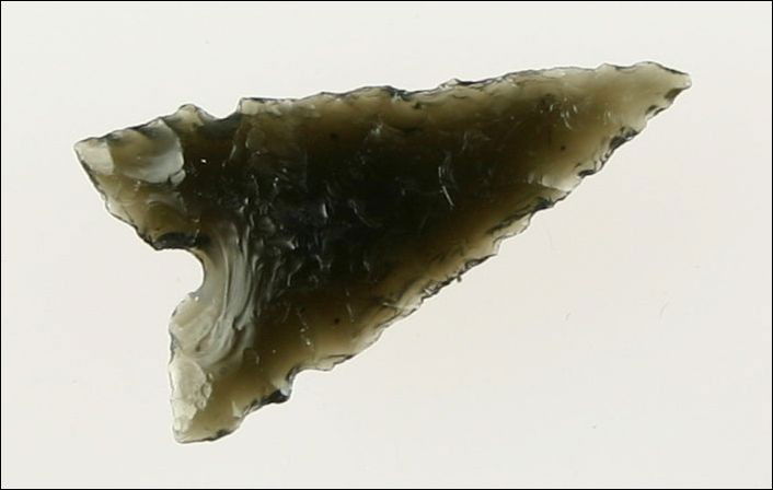 Super Fine 7/8" Desert Sierra: Super example. Nice glossy jet black Obsidian. Needle tip and minute serrations. Found in Lake Co., Oregon. Ex- Kirkpatrick Collection.