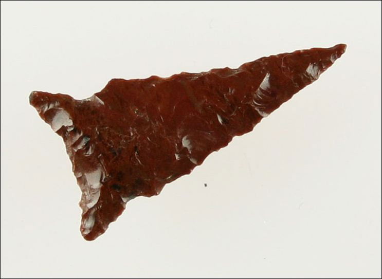 Exquisite 1" Lake River Side Notched: Exquisite arrowhead. Beautiful Scorpion Red Obsidian. Found in Lake Co., Oregon. Ex- Kirkpatrick Collection.
