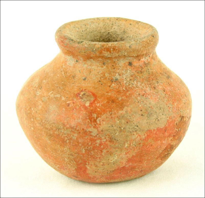 Perfect 2 5/8" Pre-Columbian Pot: West Mexican type. Ca. 200 A.D. Great condition. Nice manganese mineralization on the surface. Really sweet. Ex- Giron Collection. Grandfathered.
