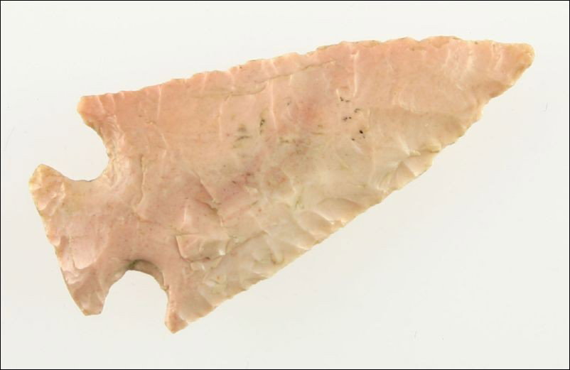 2 1/4" Pretty Pelican Lake type: Beautiful corner notch in glossy pink and cream chert. Classic 'arrowhead' form. Extremely well made with very precise flaking. Found in Scott Co., Missouri.