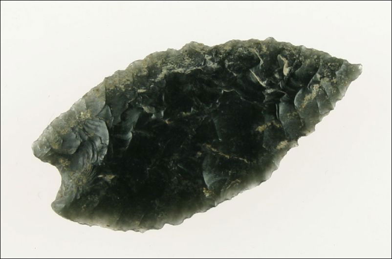 1 3/4" Constricted Base Humboldt: Pretty translucent Obsidian. Thin with beautiful flkaing. Found in Klamath Co., Oregon. Ex- Matthews Collection.