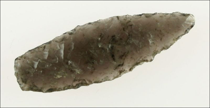 2 1/8" Cascade Shouldered: Highly translucent shimmering 'Ice' Obsidian. Found in Lake Co., Oregon. Ex- Kirkpatrick Collection.