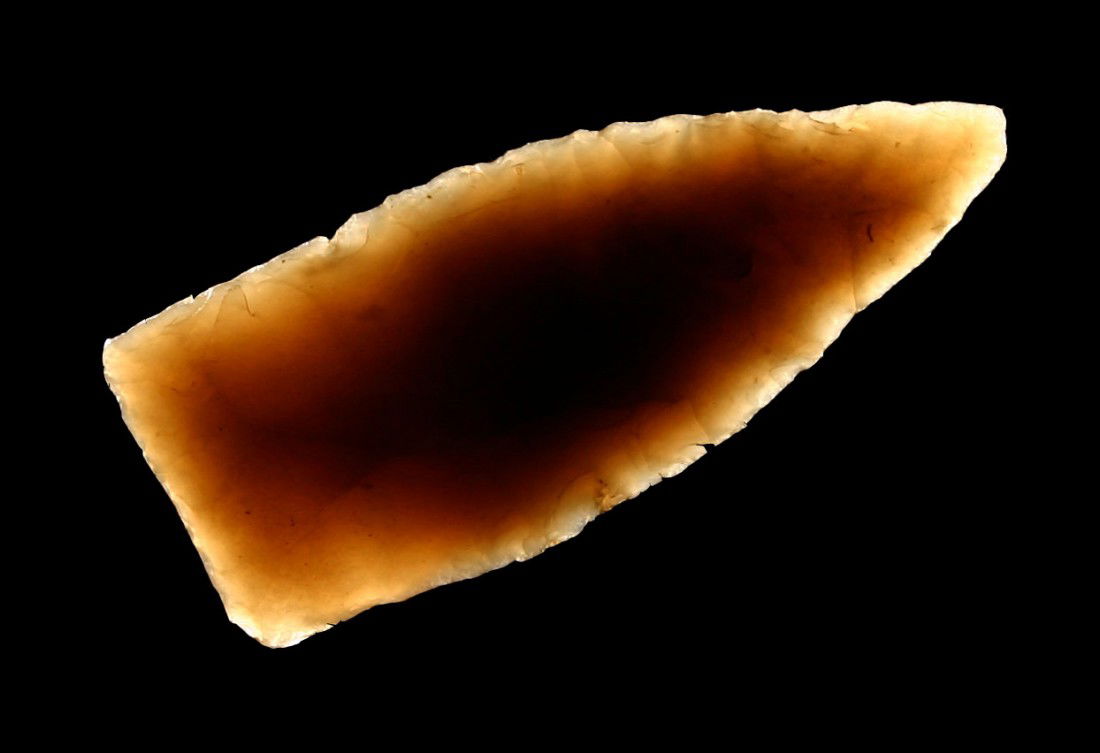 2 3/8" Jeff-type: Ground lateral edges and base. Highly translucent high grade smokey Knox Chert from Tennessee. Ex- Mitchell Collection.