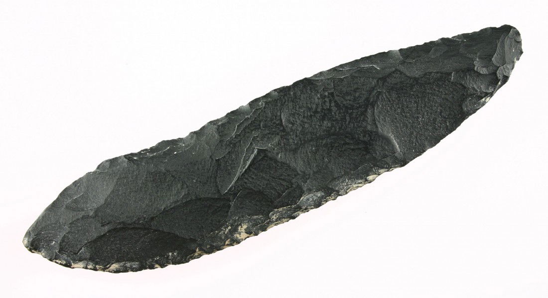 Large 6 3/4" Cascade Knife: Nice big example. Black Obsidian with a nice sheen on one side. Loaded with lime and salt deposits on the other. Really nice. Fills up a frame for sure. Found in Lake Co.Oregon. Ex- Kirkpatrick Collec