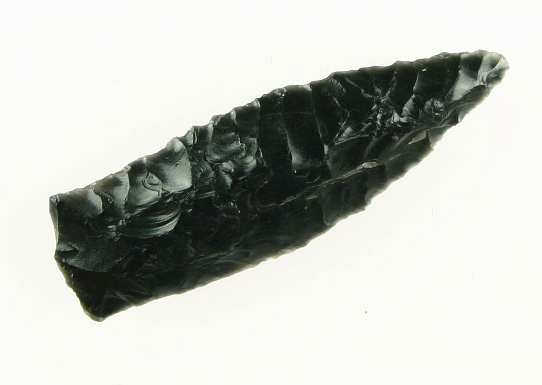 2" Eden: Ground lateral edges. Tremendous 'Cody' flaking. Jet black glossy Obsidian. Found in Lake Co., Oregon. Ex- Kirkpatrick Collection.