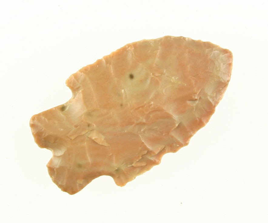 1 1/2" Elko Split Stem: Old label says - 'Pinto Basin'. Either way it's a great example. Made of high grade salmon colored chert with precise flaking and perfect symmetry. Found in Oregon. Ex- Bybee Collection.