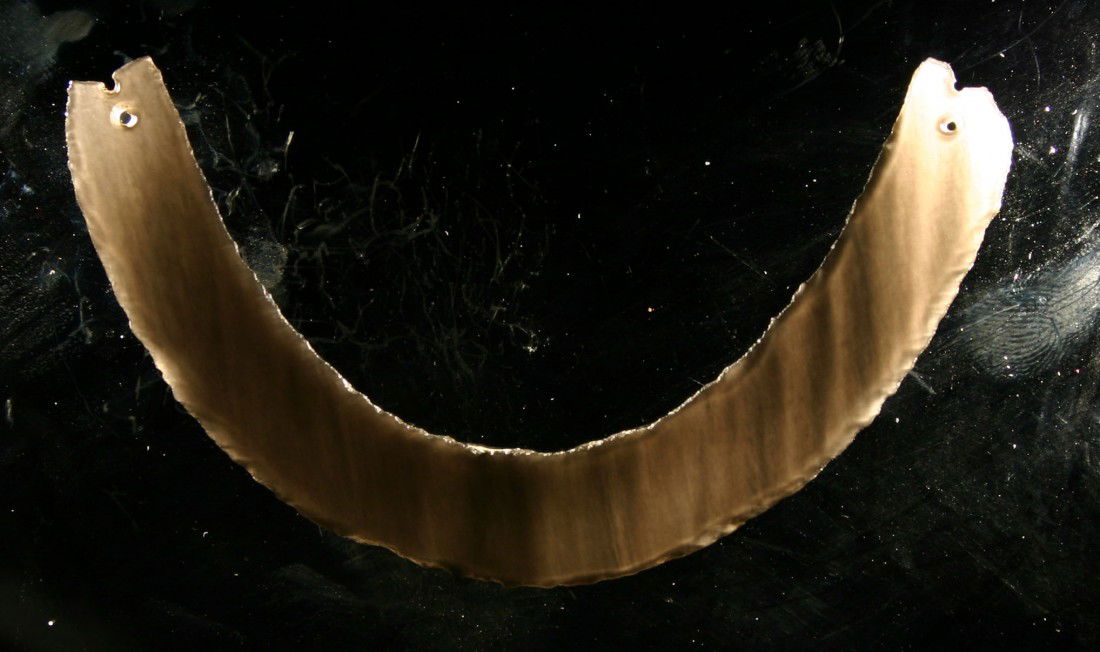 3 7/8" Aztec / Mixtec Gorget: Ultra thin jet black Obsidian. Dates to 1400 A.D. or so. Mexico. Grandfathered Collection.