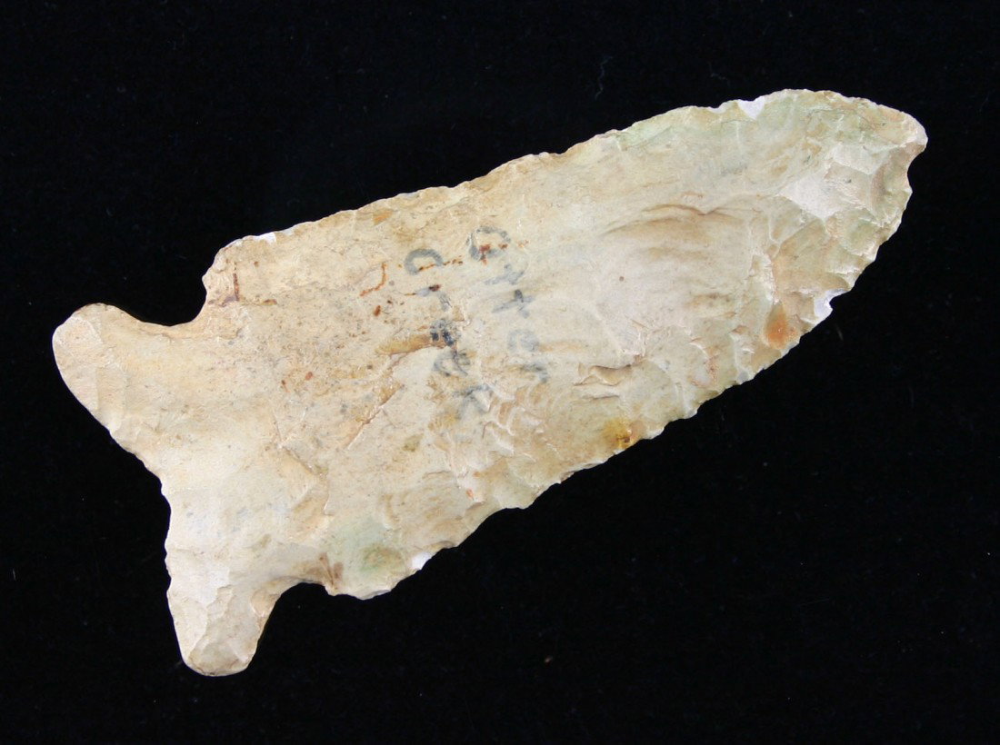 Great 2 7/8" Greenbrier: Long expanding heavily ground ears. Material appears to be Attica Chert - Indiana Green. Heavily patinated. Old writing indicates - ' Otter Creek'. Ex- Leak Collection.