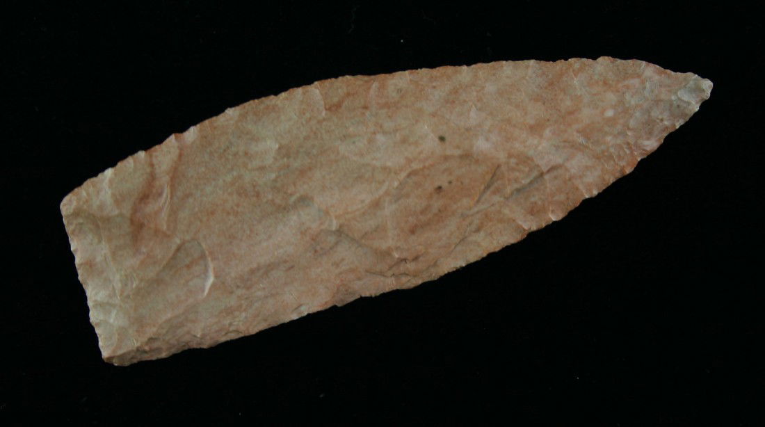 3 3/8" Stanfield Knife: Pretty glossy Salmon colored flint from Missouri. Good old piece. Thin with great symmetry. Ex- Mitchell Collection.