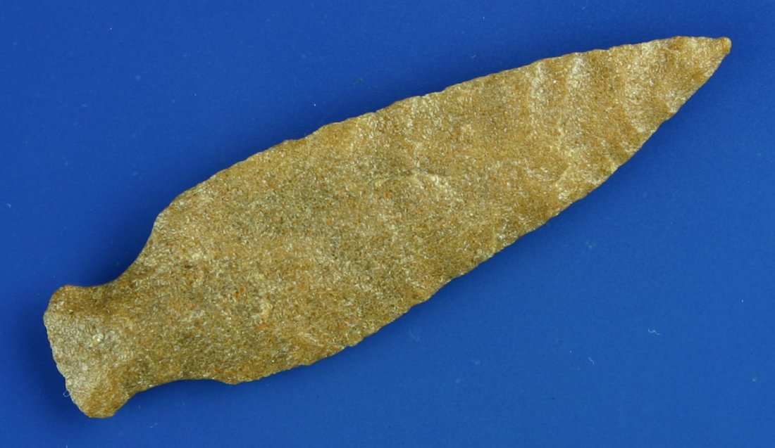 Needle tipped 2 7/8" Sugar Quartz Table Rock: Made of a very pretty caramel color quartzite. Thin and perfect. Found in Riley Co., Kansas. Ex- Butch Clark Collection.