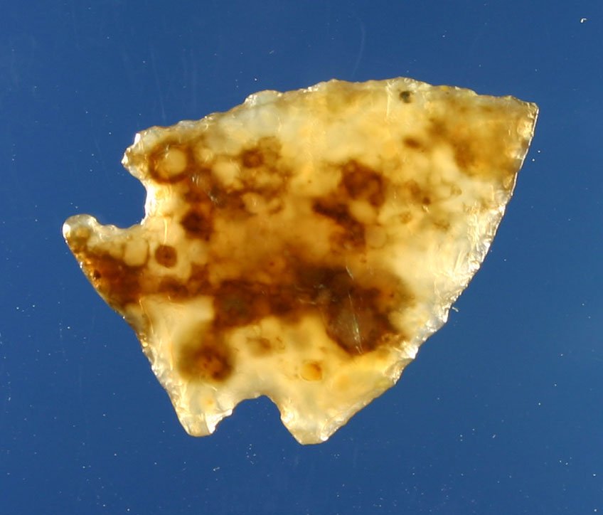 Gorgeous 1" Avonlea: Pretty beyond belief vaseline Agate with root beer colored splotches suspended in the material. Should be a piece of jewelry, nevermind an arrowhead. Ex- Lloyd Dugstad Collection, Who's Who Vol. 2, pa