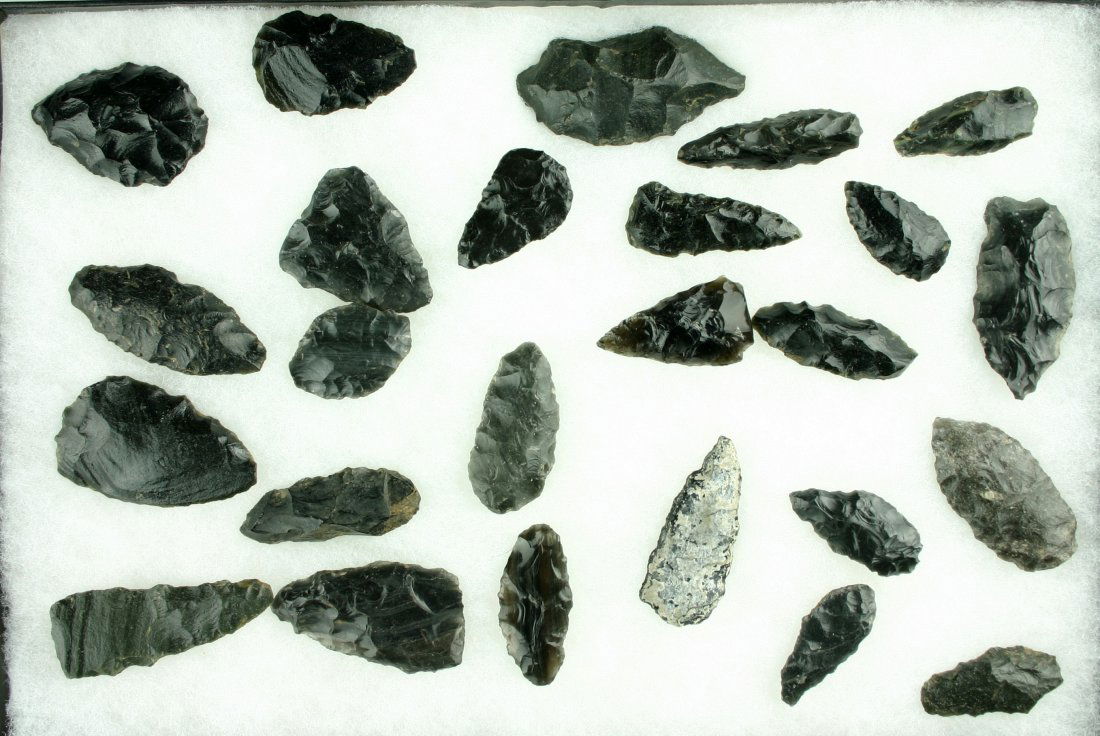 25 Obsidian Tools, Knives, and Points: All found in California and Oregon. Biggest measures 2 1/2". Ex- Butch Clark Collection.