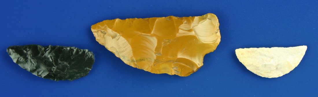 3 Western Crescents: Biggest is a 2 inch Jasper example that is built like a Cody Knife. One Obsidian and one high grade whitish mottled chert. All excellent. All Washington State. Ex- Butch Clark Collection.