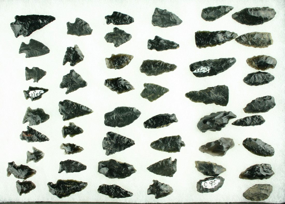 50 Assorted Obsidian Points: All jet black glossy Obsidian. All found in Northern California and Southern Oregon. Biggest is 1 3/4". Ex- Butch Clark Collection.