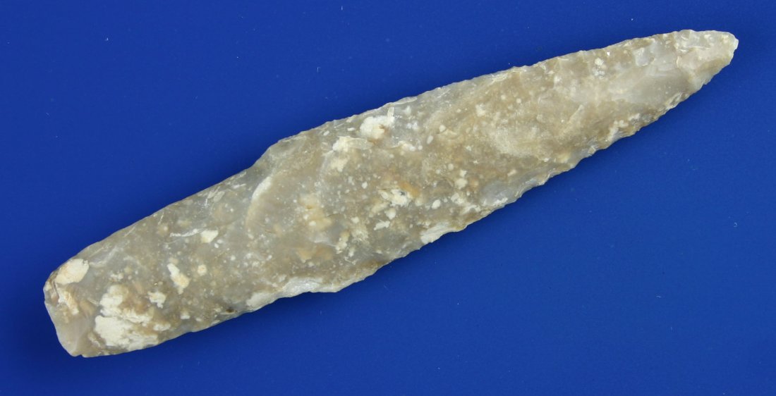Translucent 4 1/16" Wells- Jackson 'G-10' COA: Literally perfect condition. Extra long heavily ground haft . Highly translucent mottled fossil chert. Found in Travis Co., Texas. Ex- J.P. Jones Collection. Jackson 'G-10' COA.