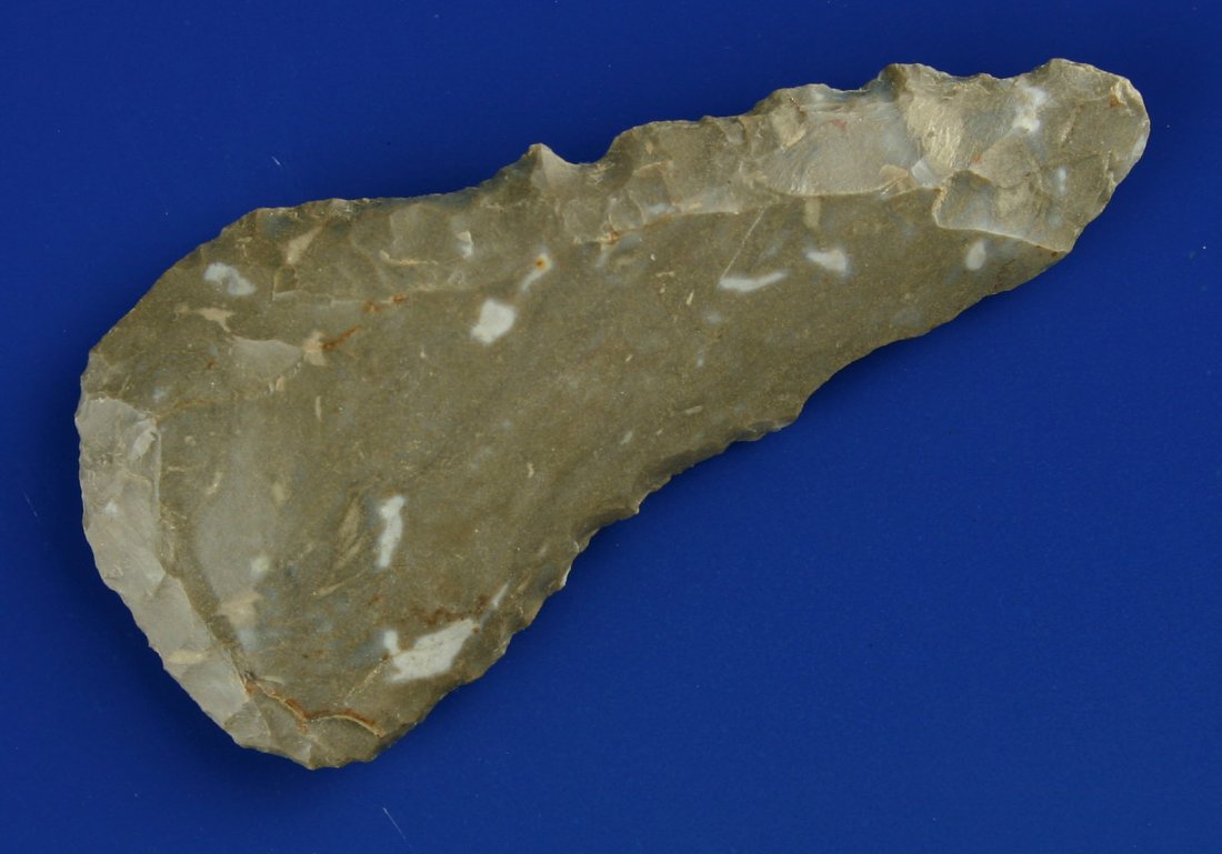 3 1/4" Paleo Knife: Uniface with classic shape. Made of glossy high grade Fort Payne in gun metal gray with blue splotches. Found in Fayette Co., Kentucky. Ex- Dr. Joe Daugherty Collection.