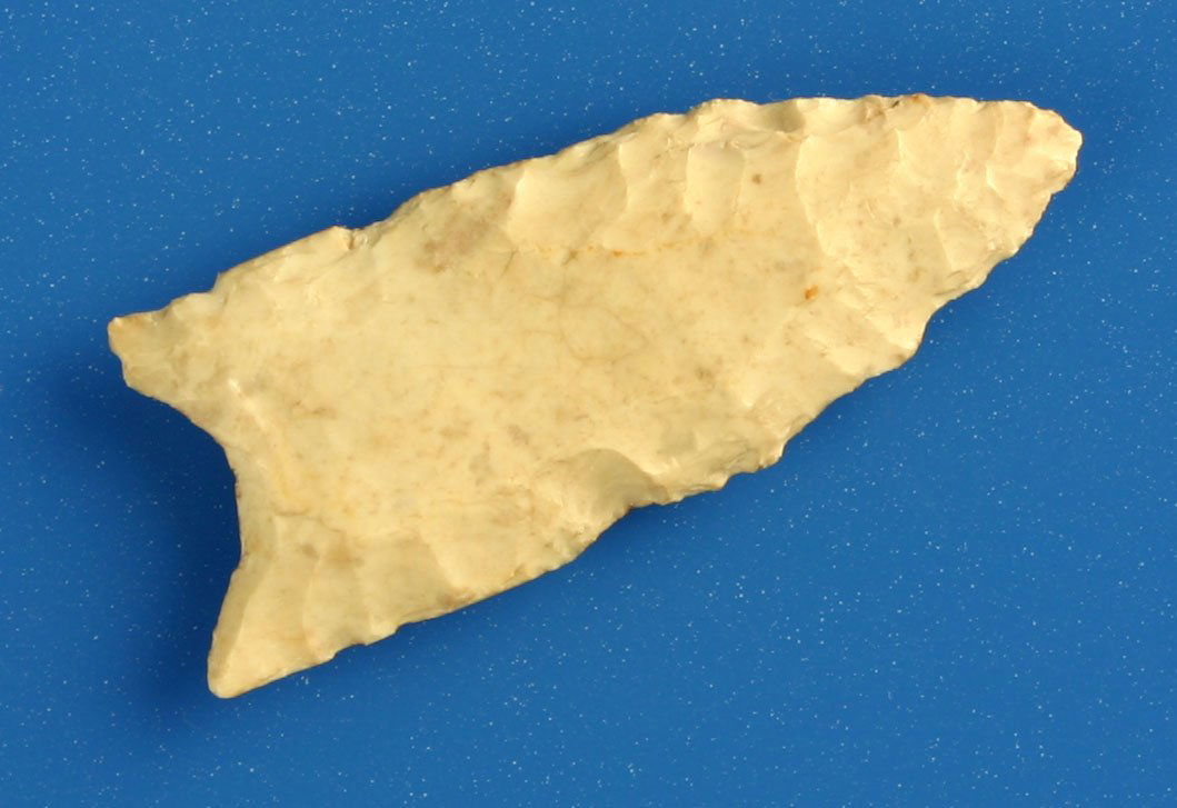 006: 1 11/16" Folsom: Found in Dane Co., Wisconsin. Ex - Schug. Fluted both sides. Cream flint.