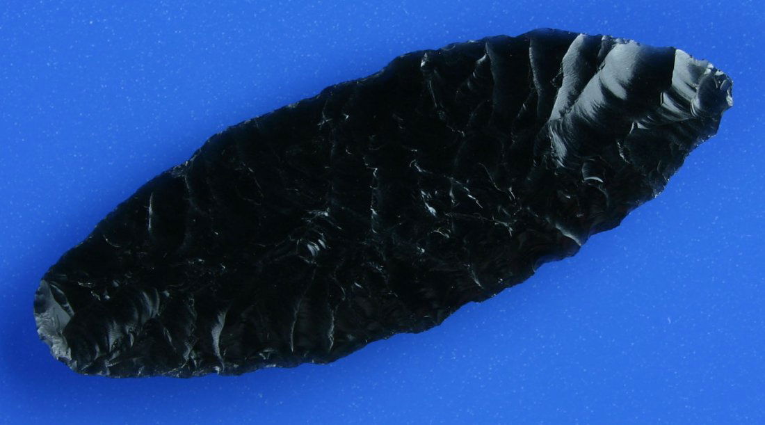 050: 2 3/4" Cascade: Jet black glossy Obsidian with great transverse flaking. Nice size and form. Found in Oregon.