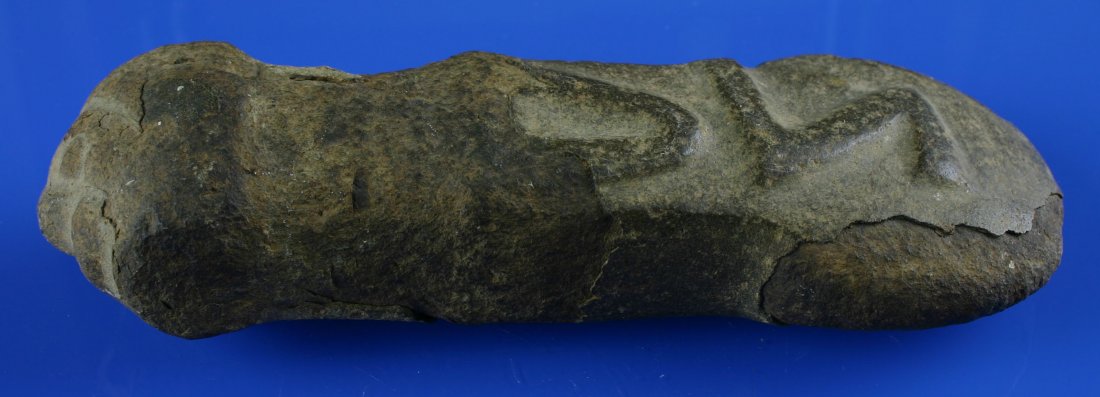 7 5/8" Taino Effigy Axe: Collected in 1881 and formerly of an East Coast Institution. Brown dense hardstone example from Dominican Republic. Human form.