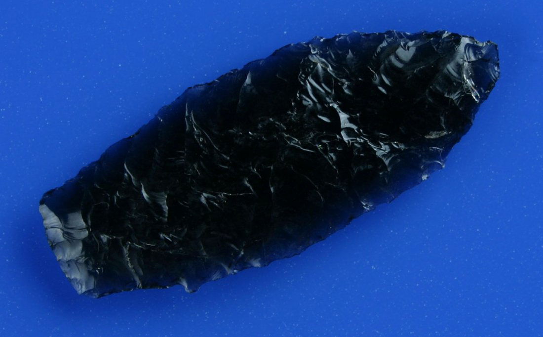 2 1/8" Windust Contracting Stem: Thin and excellent. Completely translucent 'ICE' Obsidian with awesome transverse flaking. Found in Oregon.