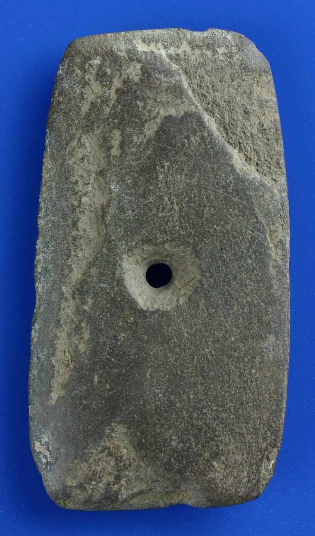 3 1/2" Center Drilled Ancient Chinese Axe: Nice example of an Archaic Chinese axe-form dating several thousand years old. Made of brown hardstone.
