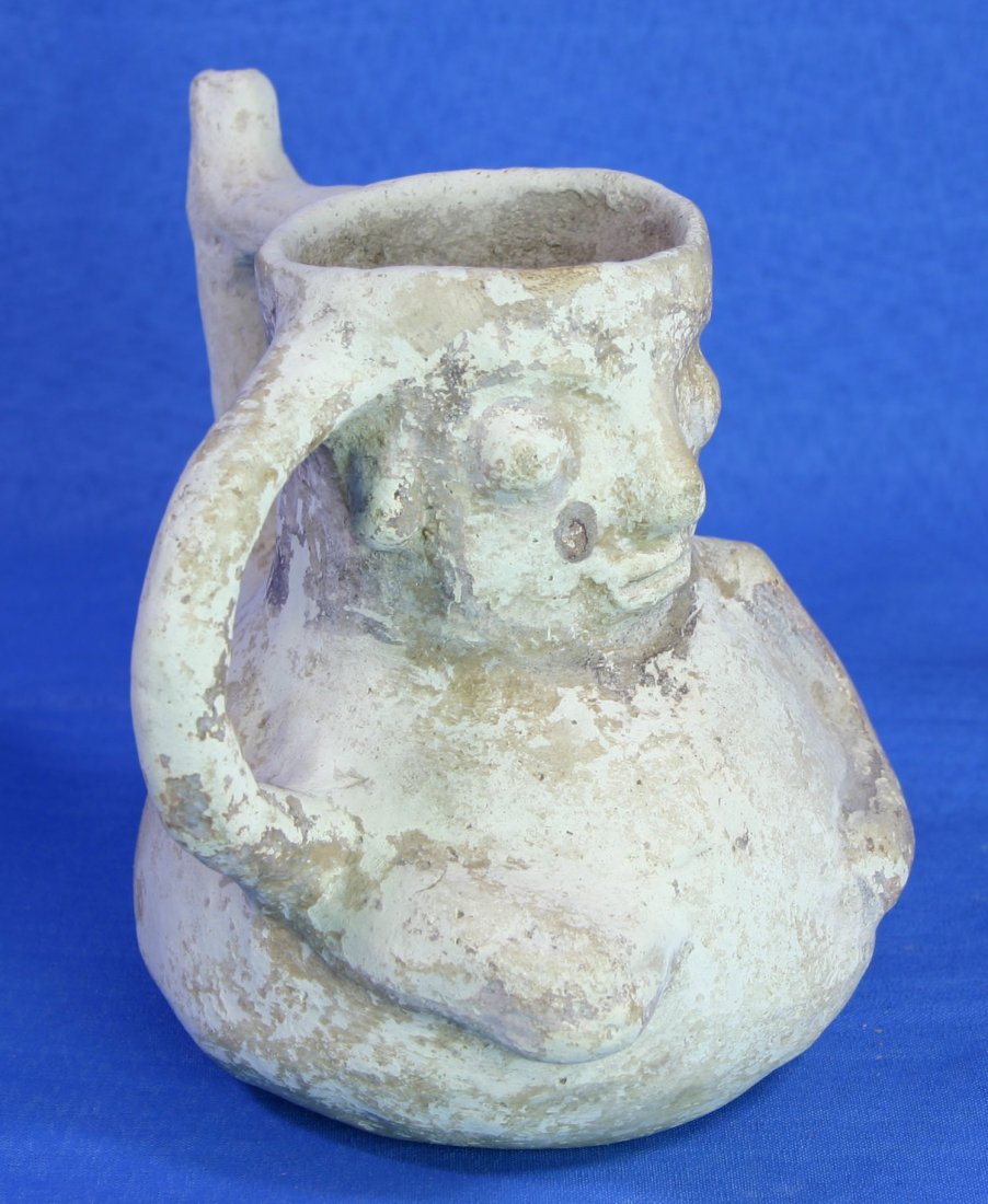 4 7/8" Human Effigy Pot - Jackson COA: Cream-colored effigy pot found on Gullivan Island in Southwest Florida. Ex - Dan Stroud Collection. Caribbean influence. Jackson COA.