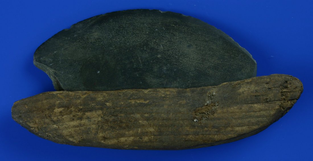 5 3/8"x2 5/8" Yupik Eskimo Ulu: Ulu with slate and wooden handle in excellent condition. Reported from St. Lawrence Island, Alaska. Circa 1605-1805 AD. Hafting has been stabilized.