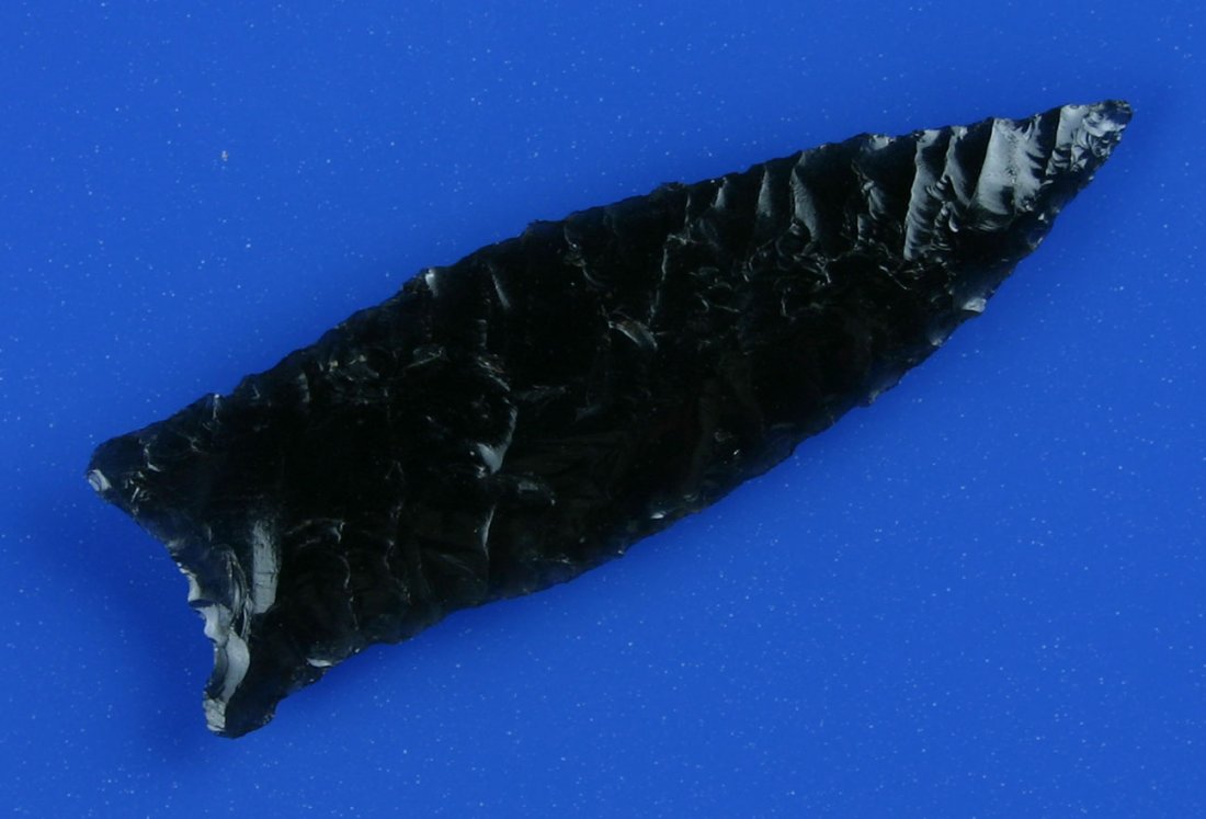 2" Humboldt - Jackson COA: Shimmering translucent 'Ice' Obsidian with flaking to die for. Thin with great form to boot. Found in Lake Co., Oregon. Ex- Kirkpatrick Collection. Jackson COA.