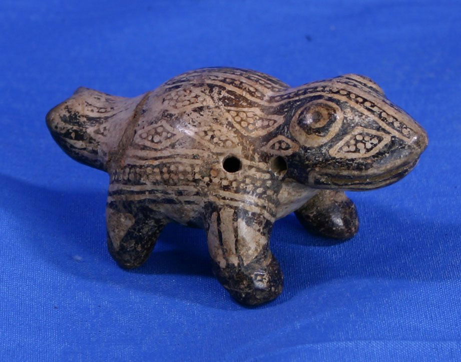 3 3/16" Nicoya Frog Effigy Ocarina: Exceptional artifact. Made of fired clay. Actually still works even though it is over 1000 years old. Intricate painted desgns are still vibrant. Ex- Guy Frederick Collection. Jackson COA.